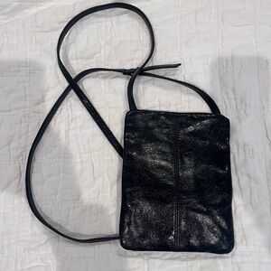 HOBO Black Crossbody Bag with Adjustable Strap and Compact Design
